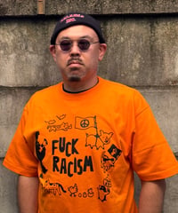 F*ck racism 〜オレンジ色をゆるーく取り戻せ〜（デザイナー：はくせんまがり）