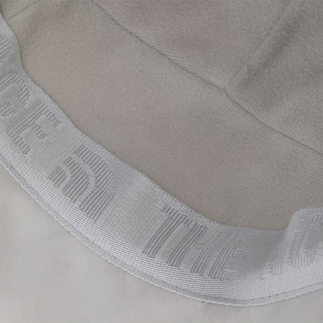 WL FLEECE EARMUFF CAP WHITE SAND NE3CS57K