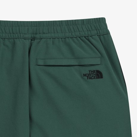 TNF TRACK PANTS SEA PINE NP6KR54L