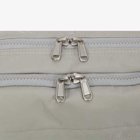 TRAVEL CROSS BAG M GRAYISH KHAKI NN2PS30C