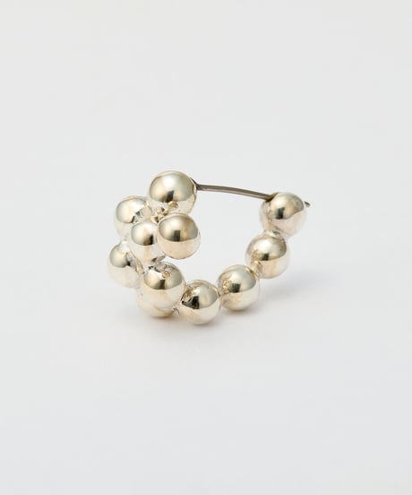 Modeling Orb hoop pierce haif silver