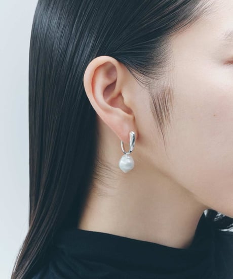 Aging baroque pearl pierce pair silver