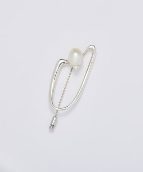 Aging baroque pearl brooch silver