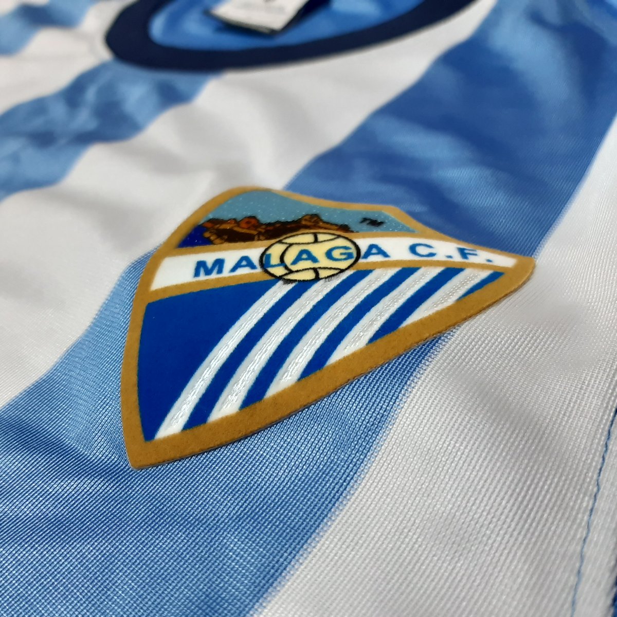 NIKE - 新品未使用 NIKE 2013-14 マラガCF ユニフォーム 水色 白 L NIKE - 新品未使用 NIKE 2013-14 マラガCF ユニフォーム 水色 白