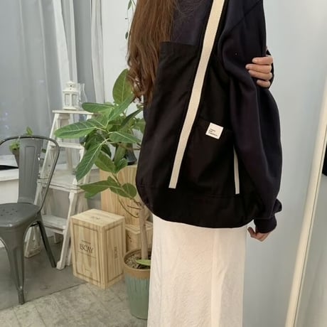 white on black tote bag