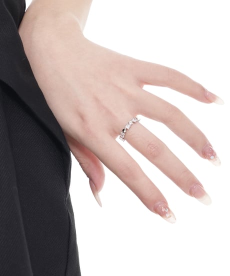 Stone and metal eternity ring
