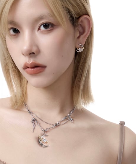 Moon and stars pierce