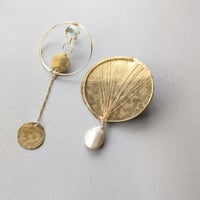 廻る