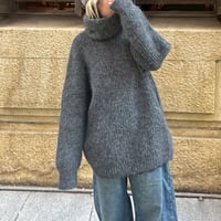 over high neck sweater