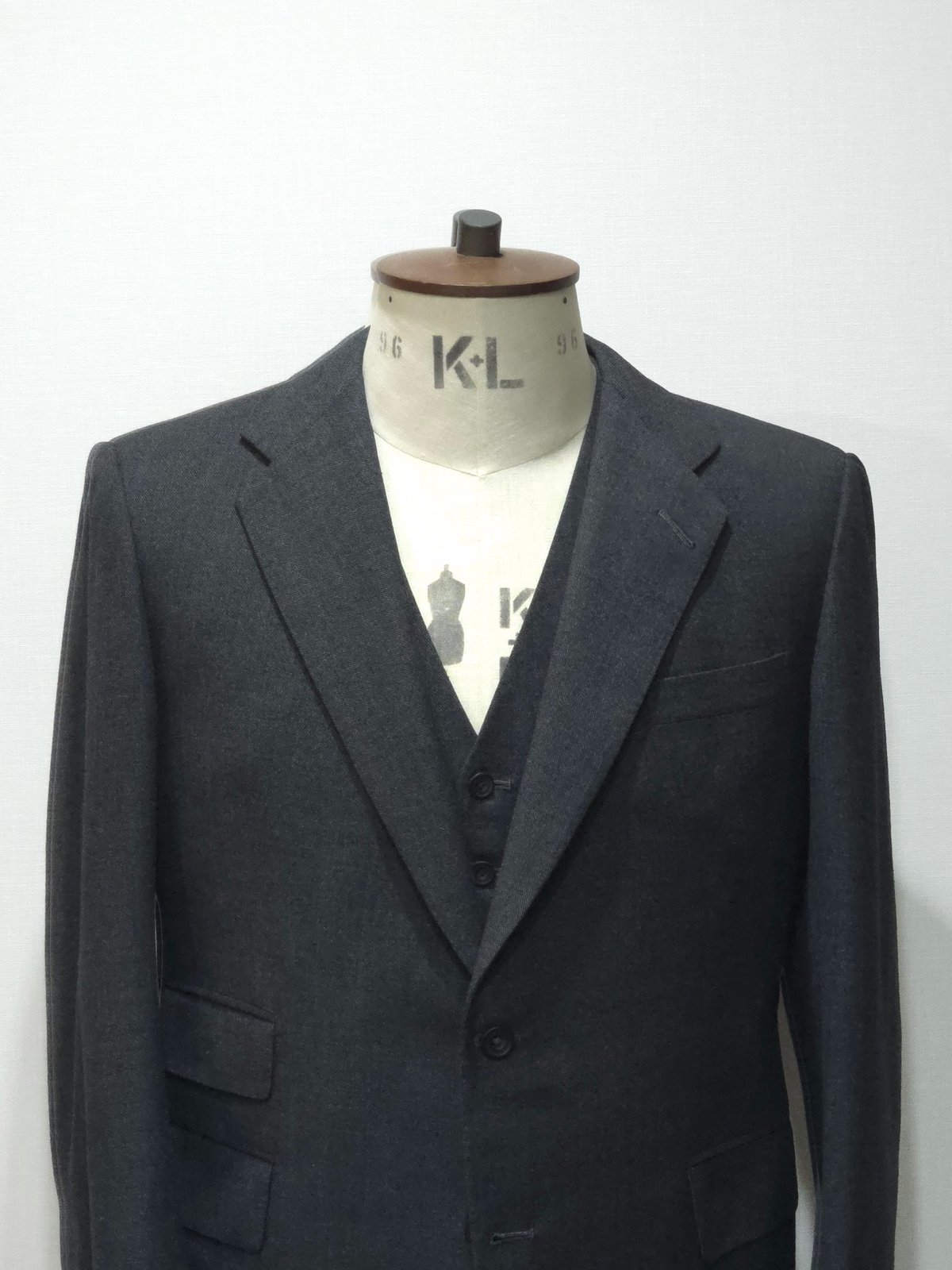 H. Huntsman & Sons “Charcoal Three-Piece Suit i