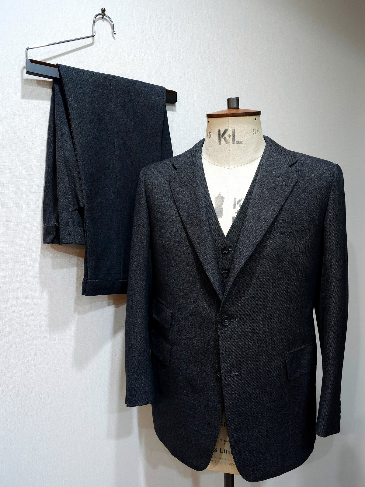 H. Huntsman & Sons “Charcoal Three-Piece Suit i