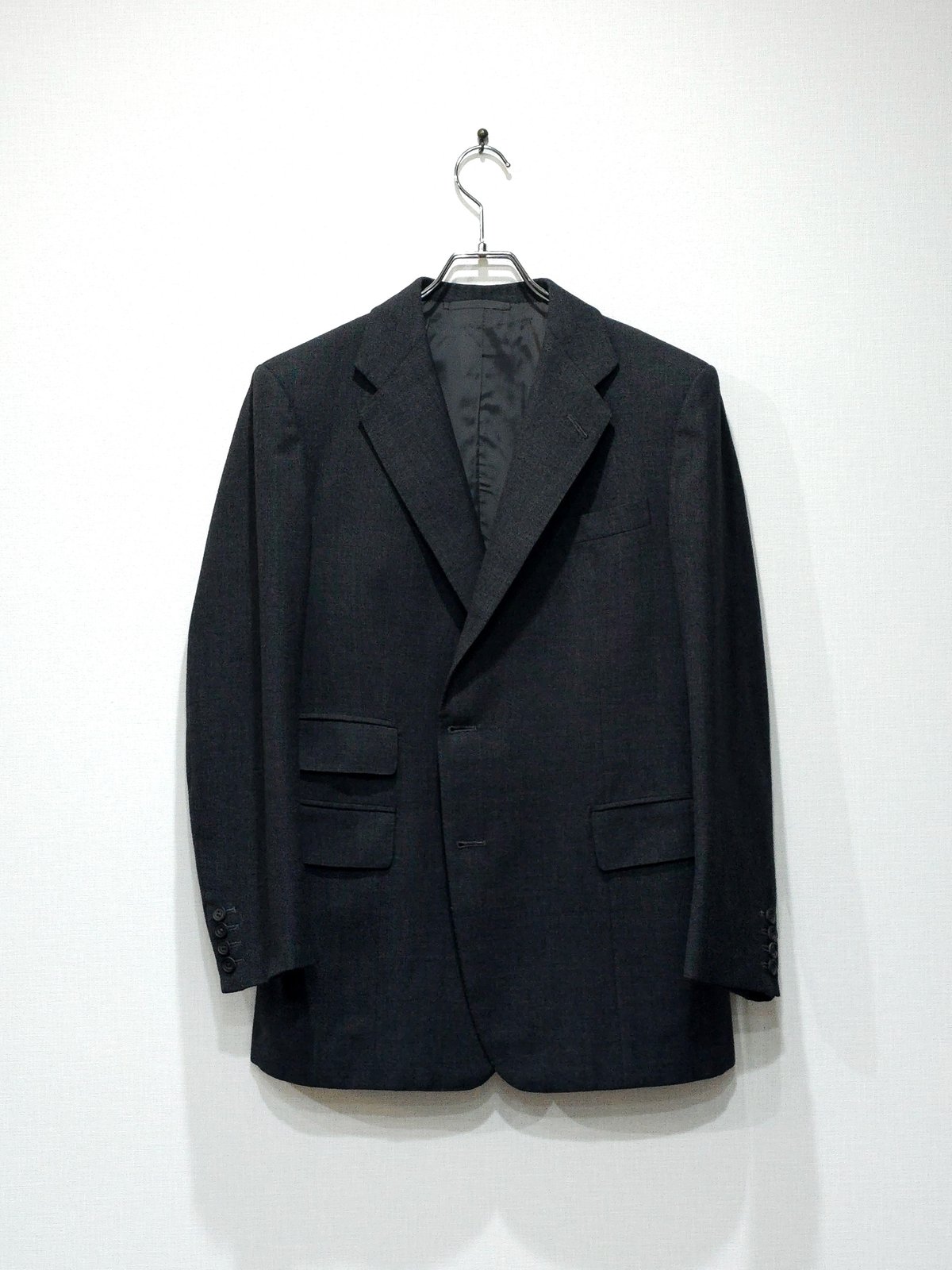H. Huntsman & Sons “Charcoal Three-Piece Suit i