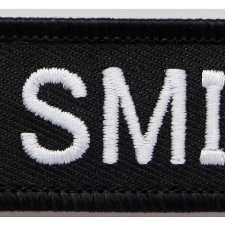ワッペン スマイルマーク SMILE マジックテープ着脱 笑顔のニコちゃん 刺繍パッチ サイズ：10×2.5cm