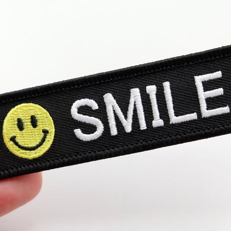 ワッペン スマイルマーク SMILE マジックテープ着脱 笑顔のニコちゃん 刺繍パッチ サイズ：10×2.5cm