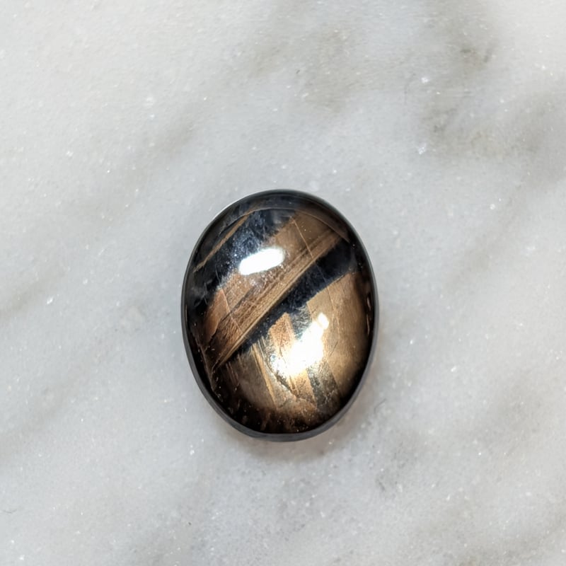 GIA鑑別書】非加熱ゴールドシーンスターサファイア 2.47ct 7.15×6.15mm