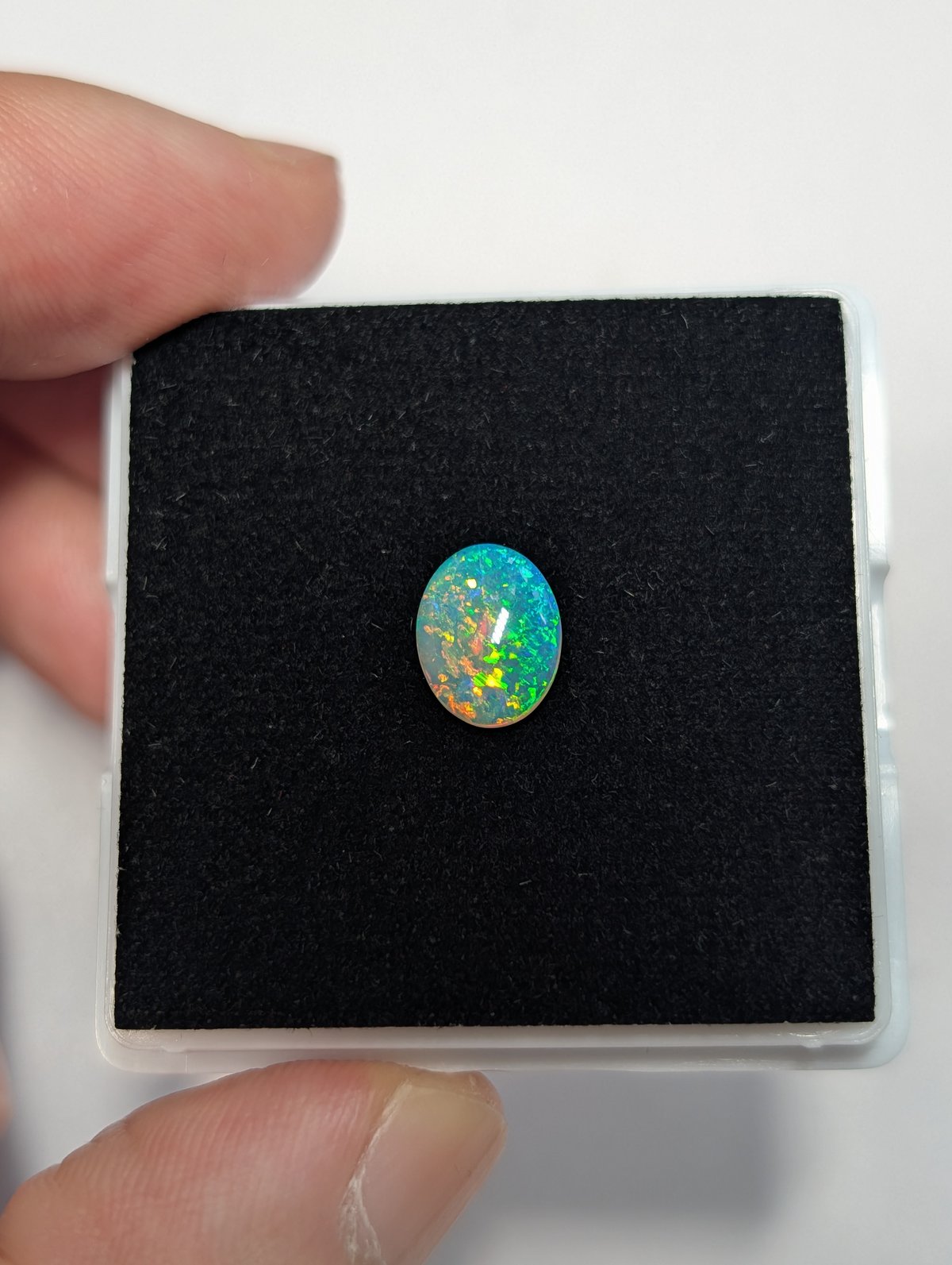 オーストラリア産 オパール 0.92ct 8.88×6.95mm オーバルカボション