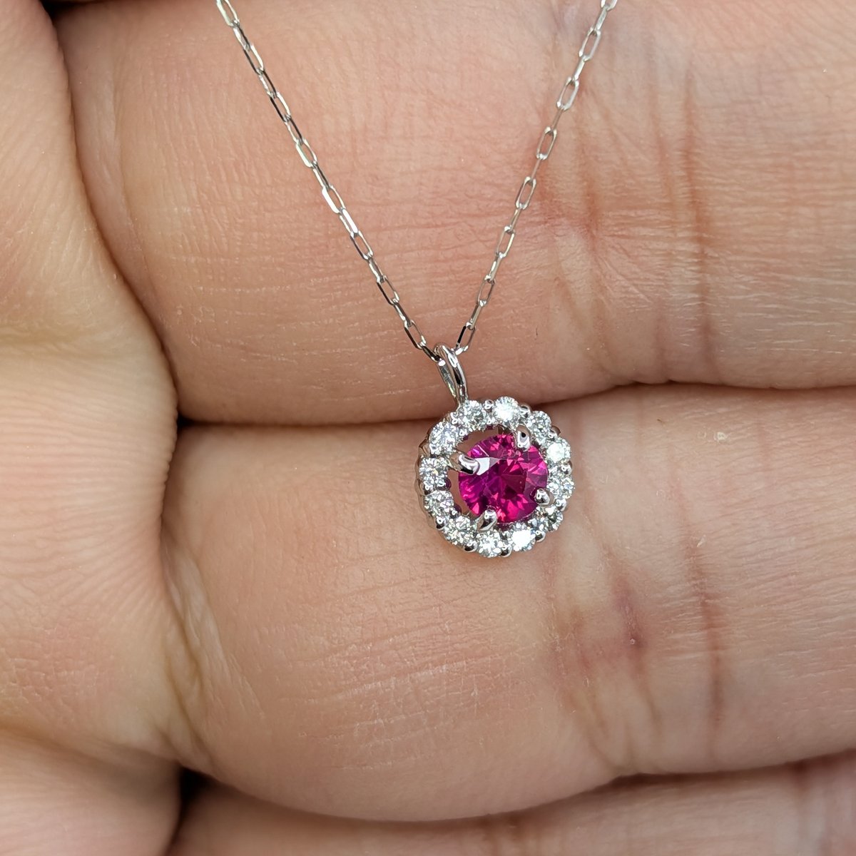 ビルマ産ルビー PT900/850 0.18ct ダイヤモンド 0.08ct 取り巻き