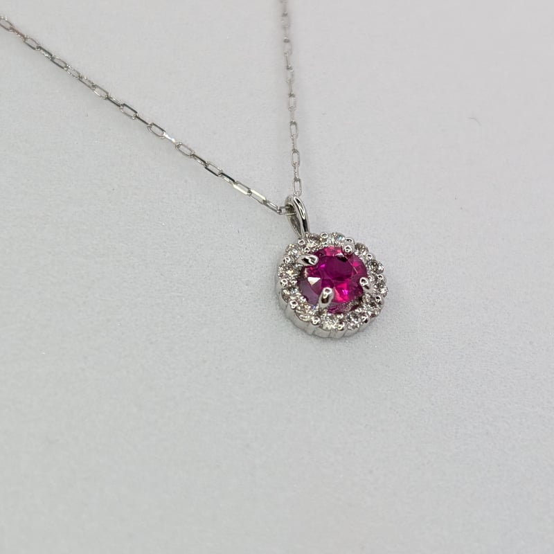 ビルマ産ルビー PT900/850 0.18ct ダイヤモンド 0.08ct 取り巻き