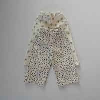 the beige / patterned straight pants
