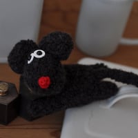 つかまってる風