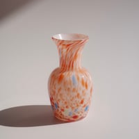 Orange marble vase