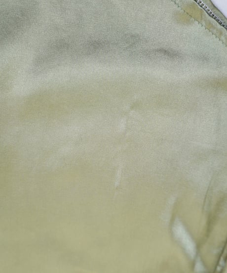 Champagne-colored glossy satin blouse