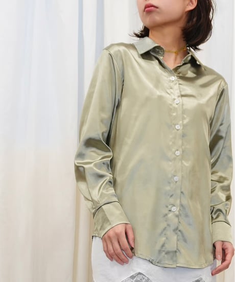 Champagne-colored glossy satin blouse
