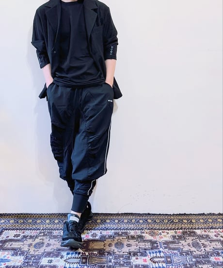 GLIMCLAP ストレッチナイロンシャーリングサルエルパンツ 054