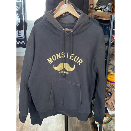 【Zoe Karssen】「MONSIEUR」ロゴ＆マスタッシュ（ひげ）プリント フーディー ブラック XLサイズ