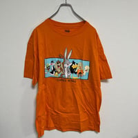 ルーニー・テューンズ Tシャツ オレンジ　未使用品