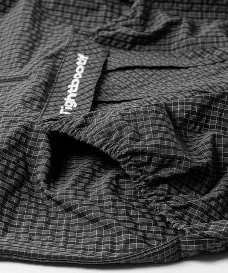 TIGHTBOOTH | TBPR / RIPPLE PLAID ANORAK | Black