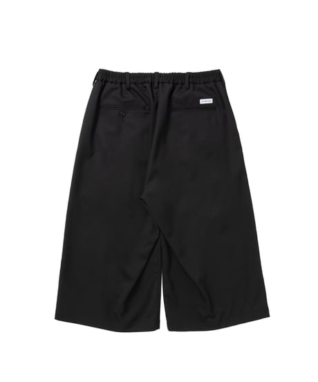 𝐂𝐎𝐎𝐓𝐈𝐄 | Wool Gabardine Shin Cut Easy Trousers | Black