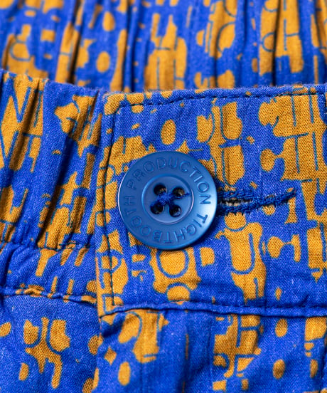 TIGHTBOOTH | BLEEDING LOGO BALLOON PANTS | Blue x Mustard