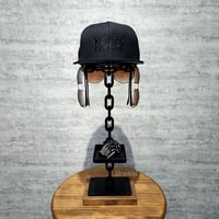 cap and glasses stand