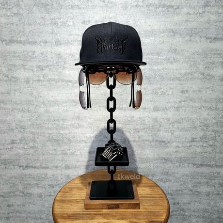 cap and glasses stand