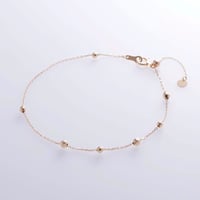 comet bracelet K18YG