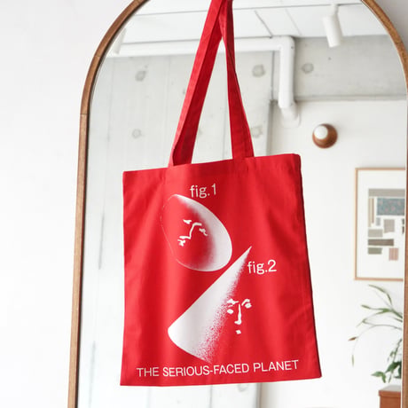 THE SERIOUS-FACED PLANET TOTE BAG