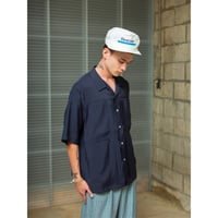 Double-pleated Aloha shirts