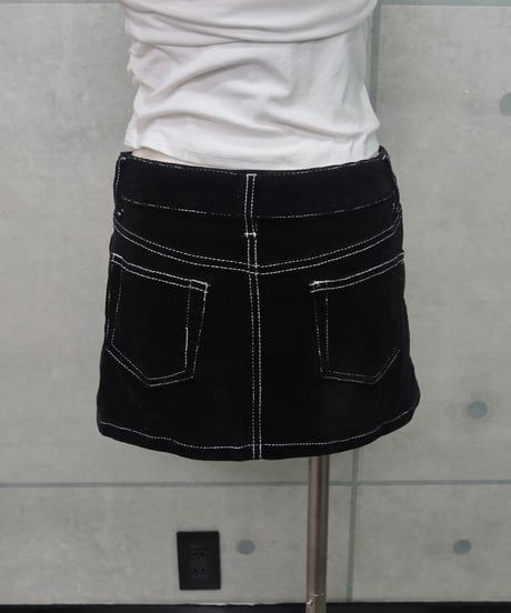 black corduroy mini skirt