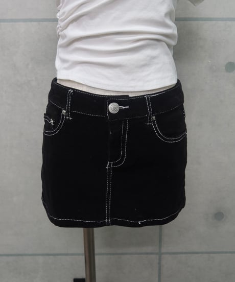 black corduroy mini skirt