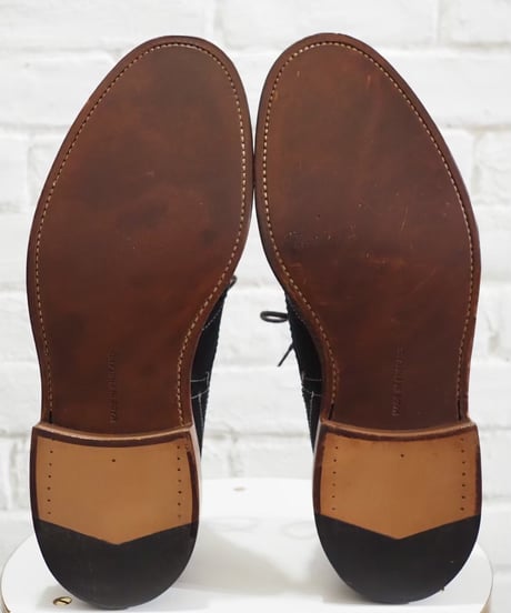 Tricker's 9