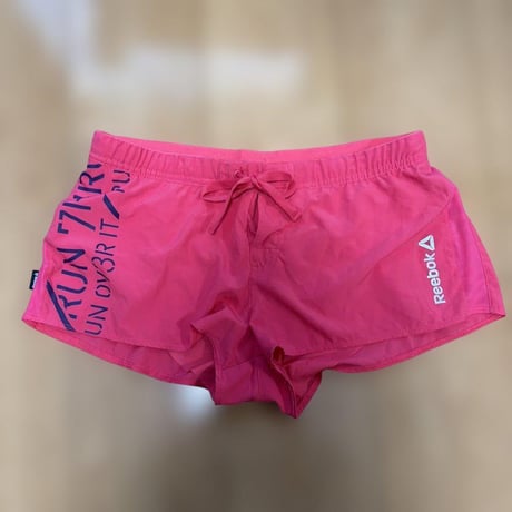 Reebok ピンク ショートパンツ J/M レディース