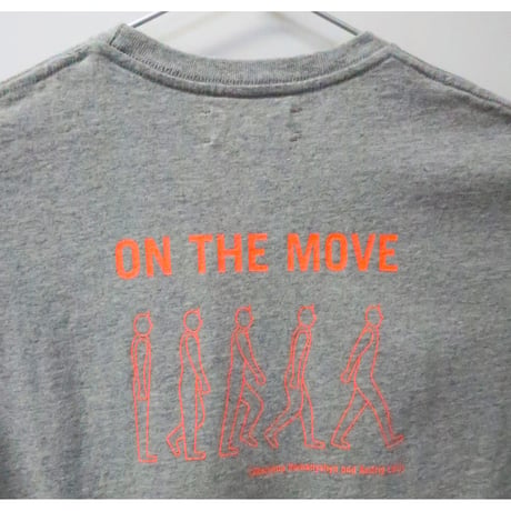 『旅するわたしたち　On The Move』×SUNSHINE＋CLOUD チャリティTシャツ（グレー・Sサイズ）
