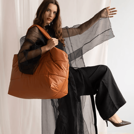Tinne+Mia_Camill big puffy weekend bag (black,adobe)