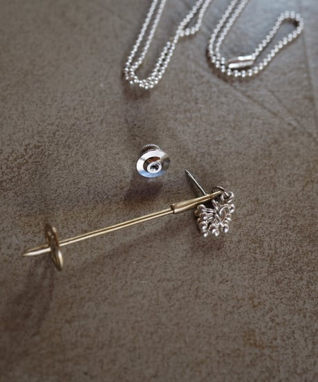 SKi stock broach necklace