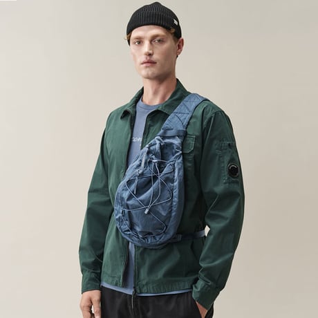 C.P. Company（シーピーカンパニー）"NYLON B CROSSBODY BACKPACK - ORION BLUE"