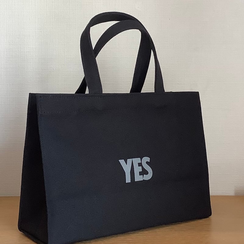 バッグ ブラック 上品デザイン　と 🌟新発売] NEW XーSMALL BAG ”YES” (BLACK COLOR)※内側にポ