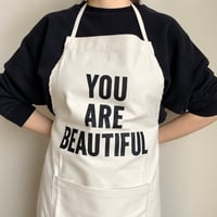 🟠9/26(土曜日)に再入荷します。 ADULT APRON   “ YOU ARE BEAUTIFUL"