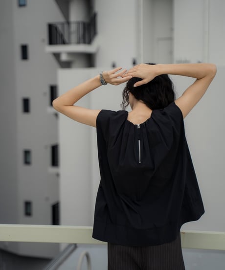tucked shoulder sleeveless blouse