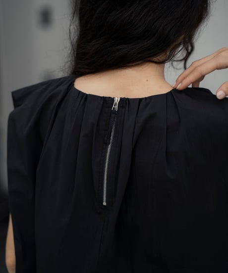 tucked shoulder sleeveless blouse